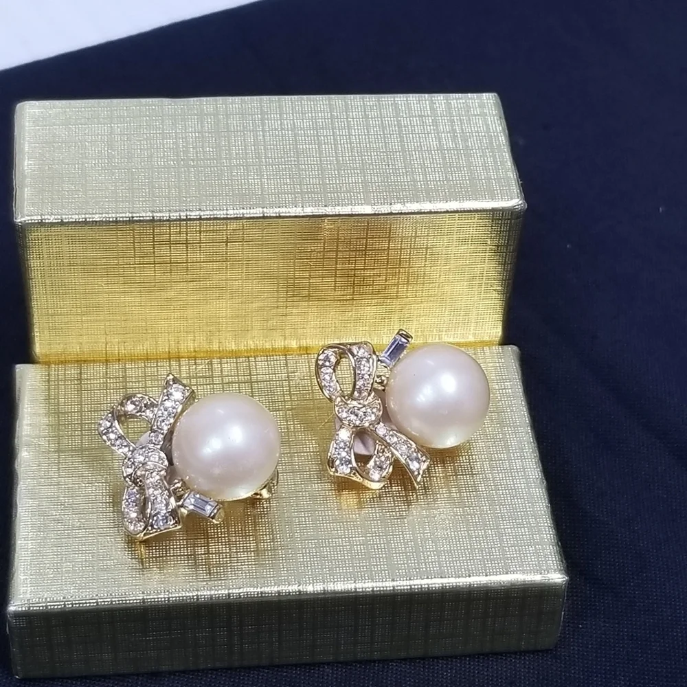 Vintage Nina Ricci  faux pearl clip on earrings
